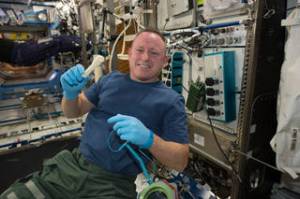 Barry "Butch" Wilmore, commander of Expedition 42 (2014-15) aboard the International Space Station, holds a ratchet wrench made with a 3-D printer on the station. Credit: NASA